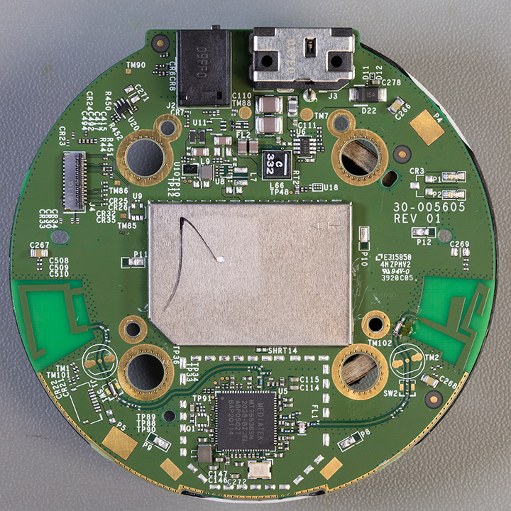 Top of the main PCB showing WiFi / Bluetooth IC at the bottom and shielding over the CPU and RAM