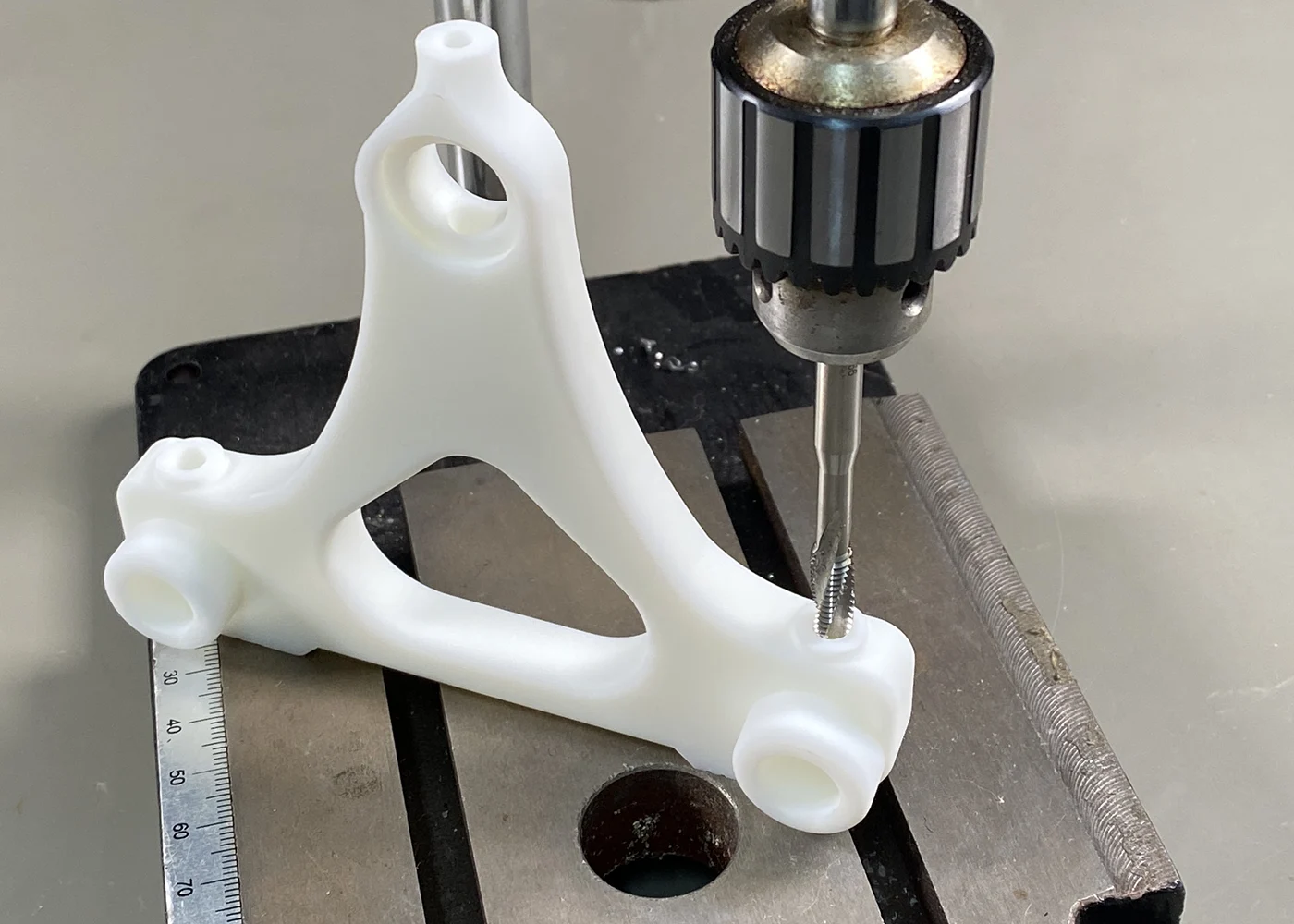 Tapping threads in plastic