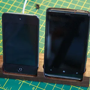 HTC HD7 and Apple iPod Touch Wooden Stand Photo